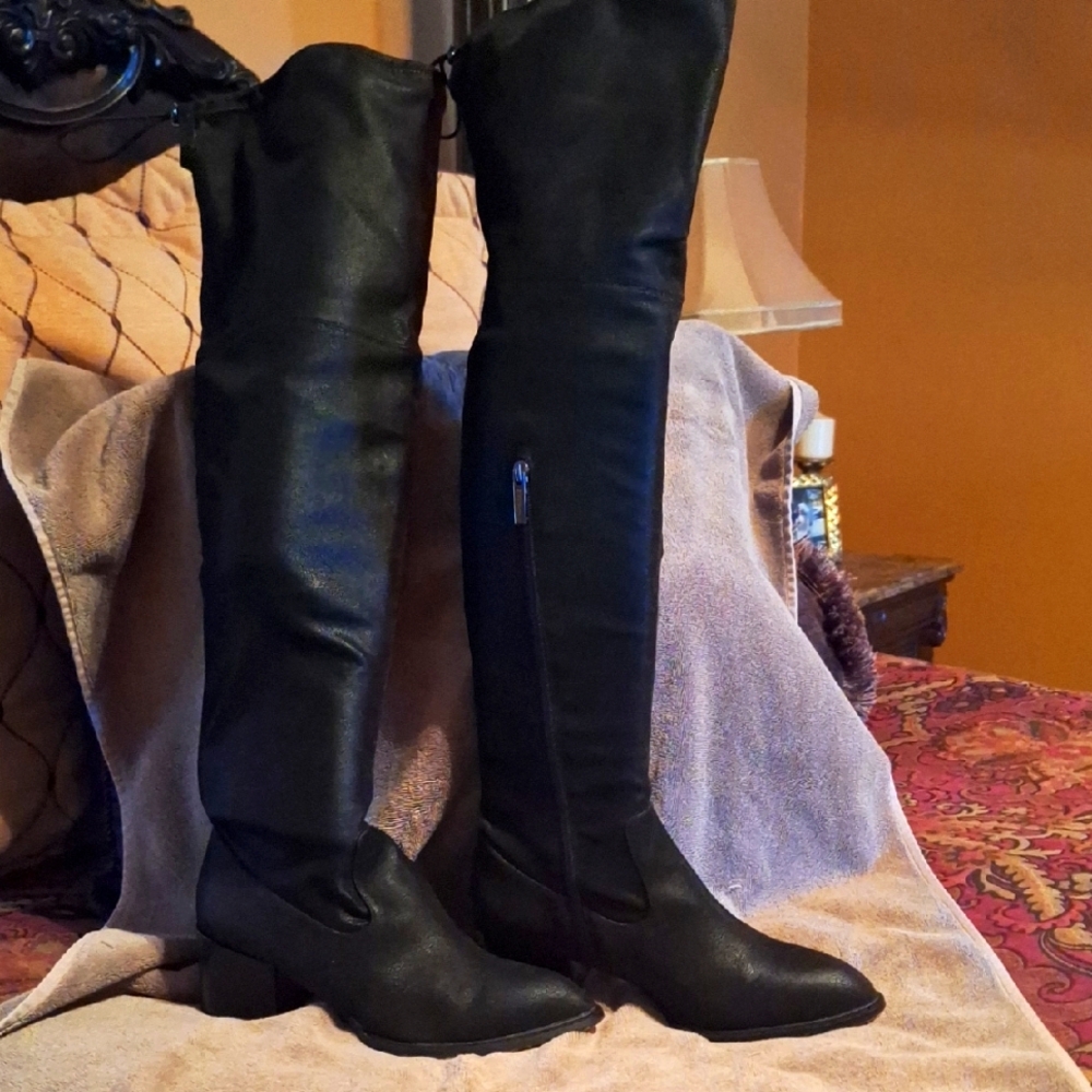 Women's black suede over the knee boots.